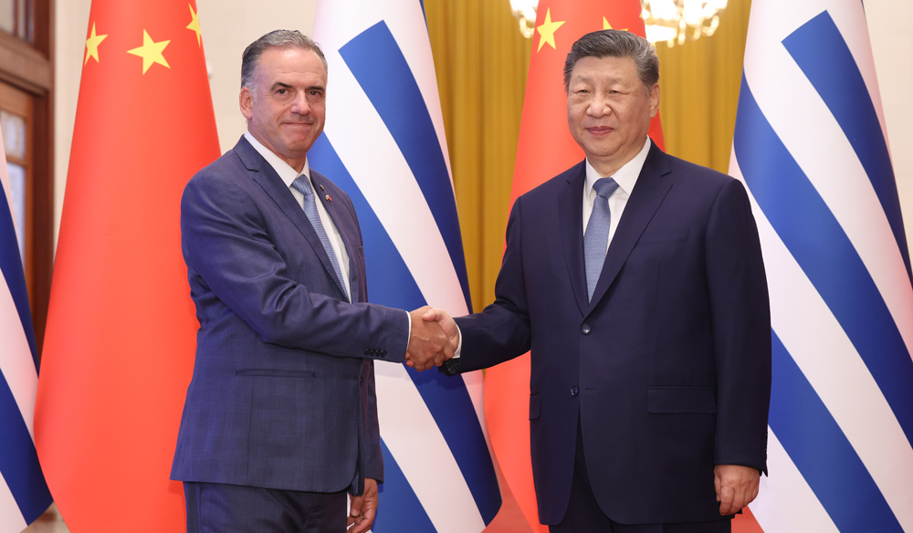 習近平同烏拉圭總統(tǒng)奧爾西舉行會談